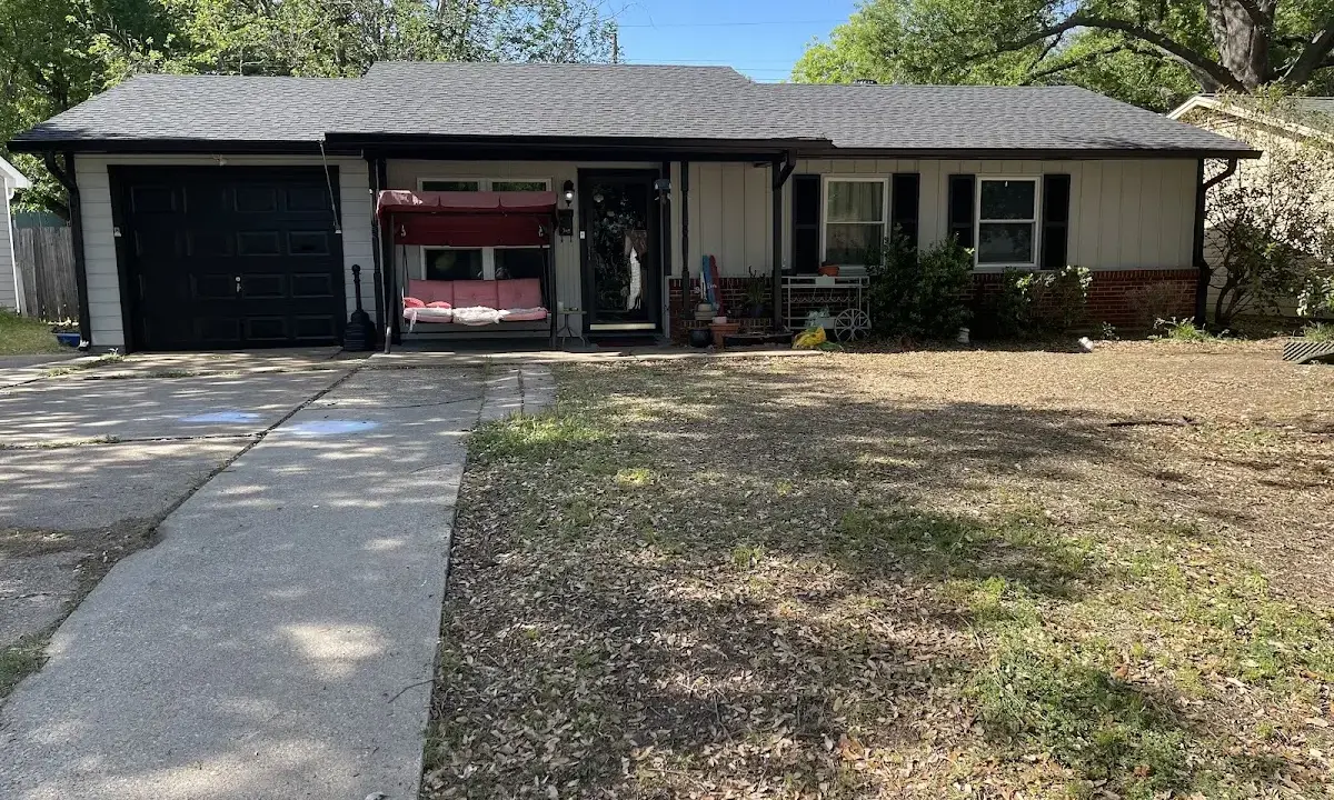 Wind Damage Roof Repair crew at work on a residential roof in Pooler